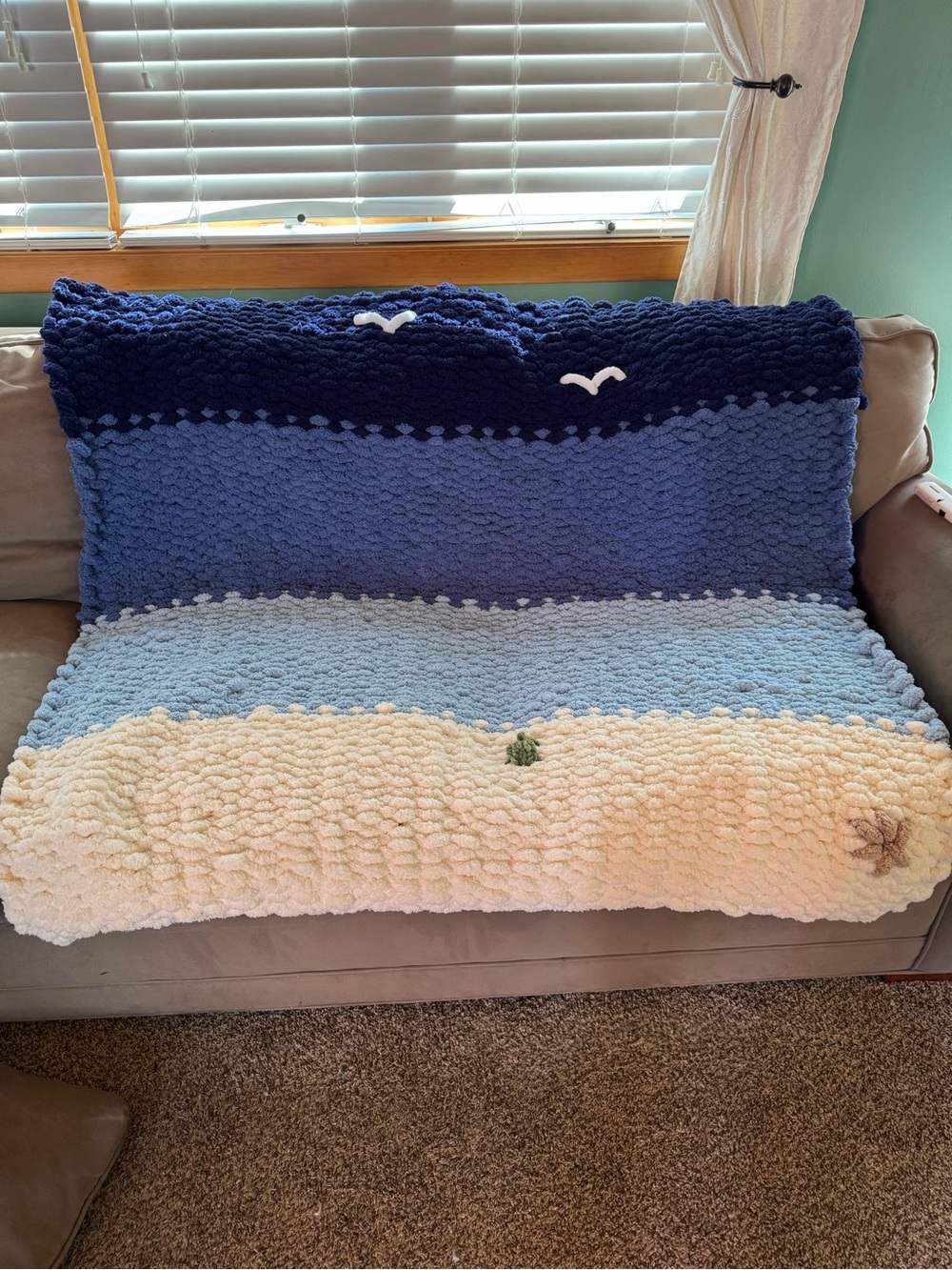 Coastal Ombre Chunky Knit Throw Blanket - Blue, Light Blue & Cream. On the beach